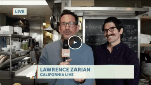 California Live Host Lawrence Zarian conducting an interview