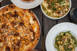 Variety of fall dishes including Butternut Squash & Caramelized Onion Pizza
