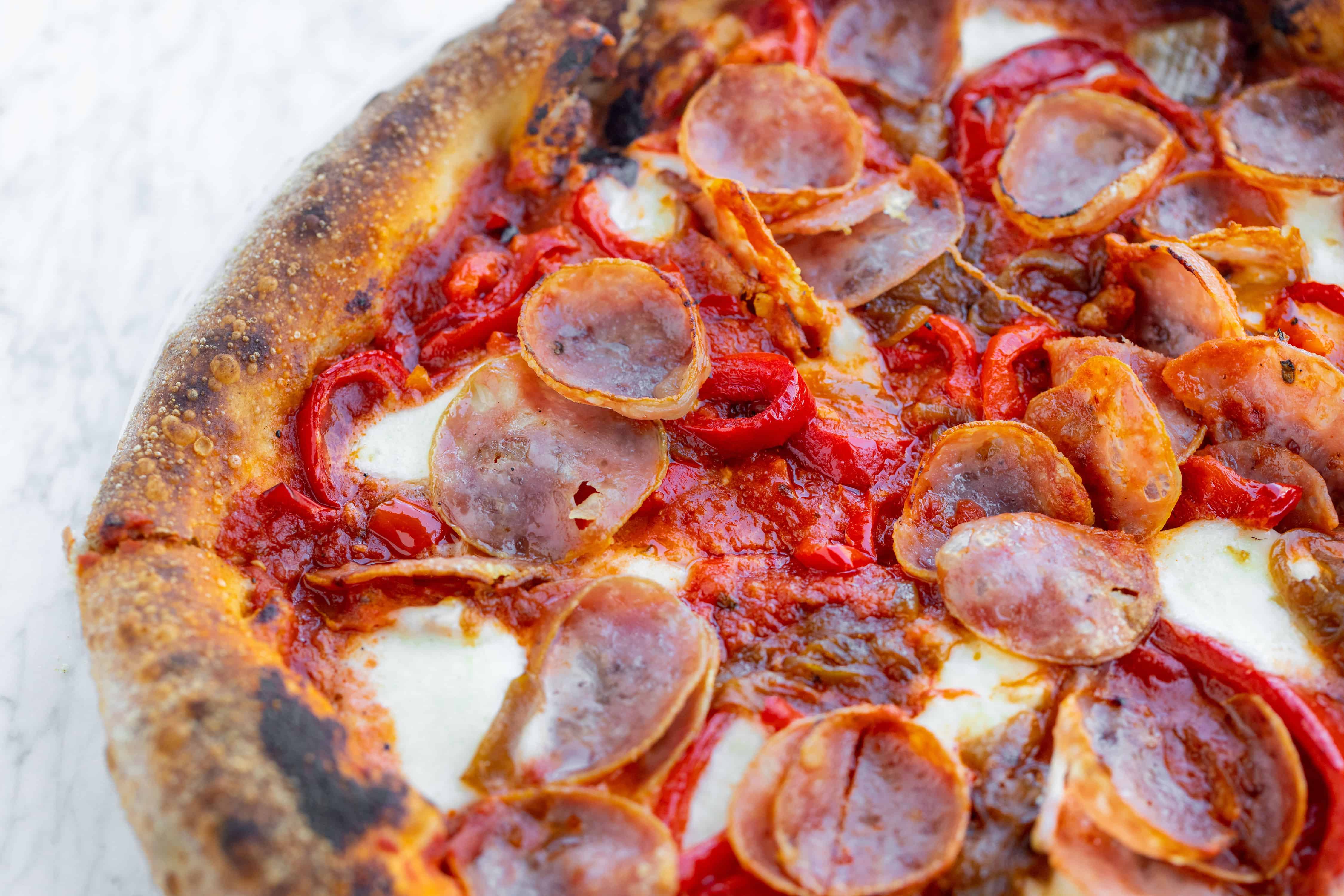 Close-Up of Felino Salame & Roasted Red Pepper Pizza